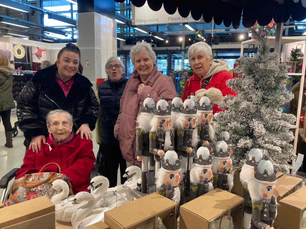 residents looking at christmas decorations