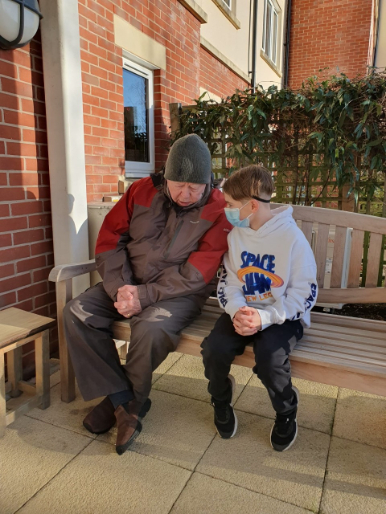 resident sat with a volunteer