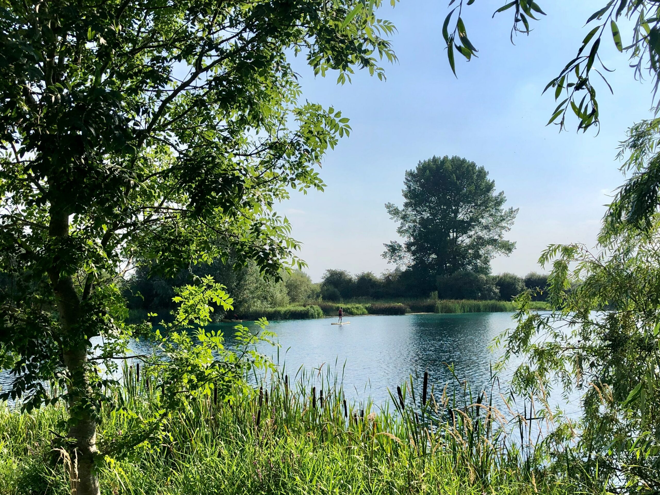 A lake in Swindon on a sunny and clear day.