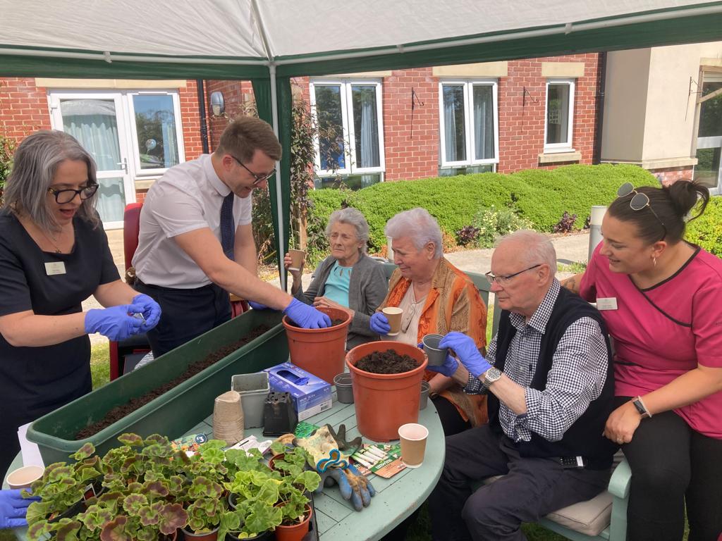 Residents sowing seeds