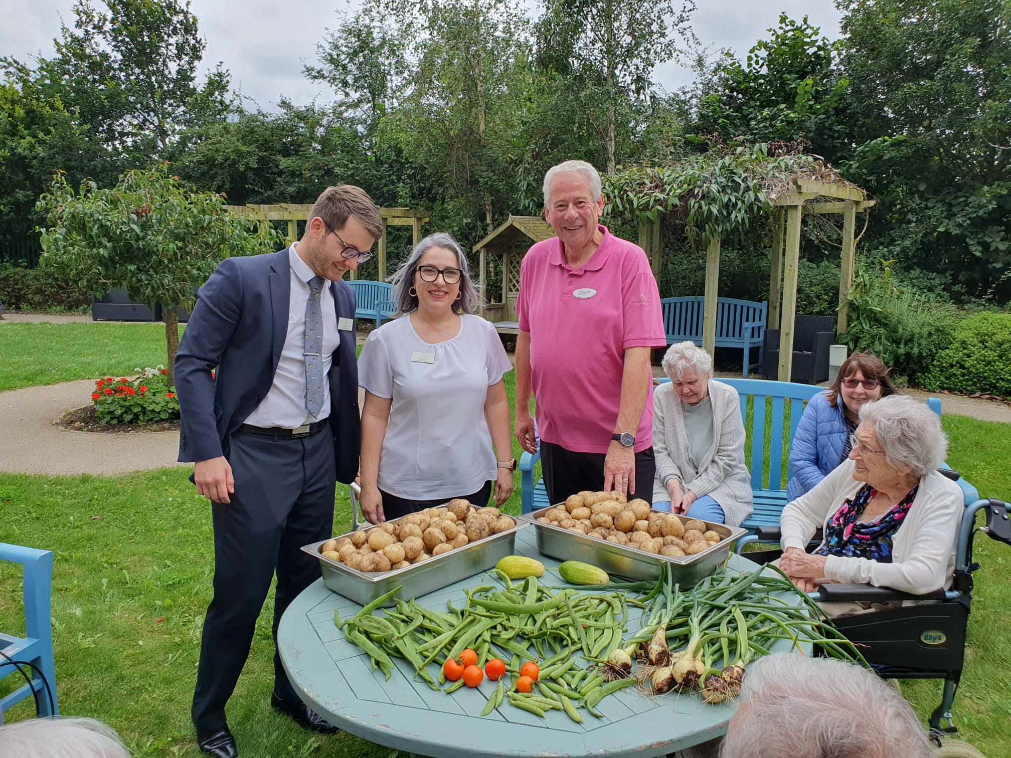Residents admiring the results of their garden project