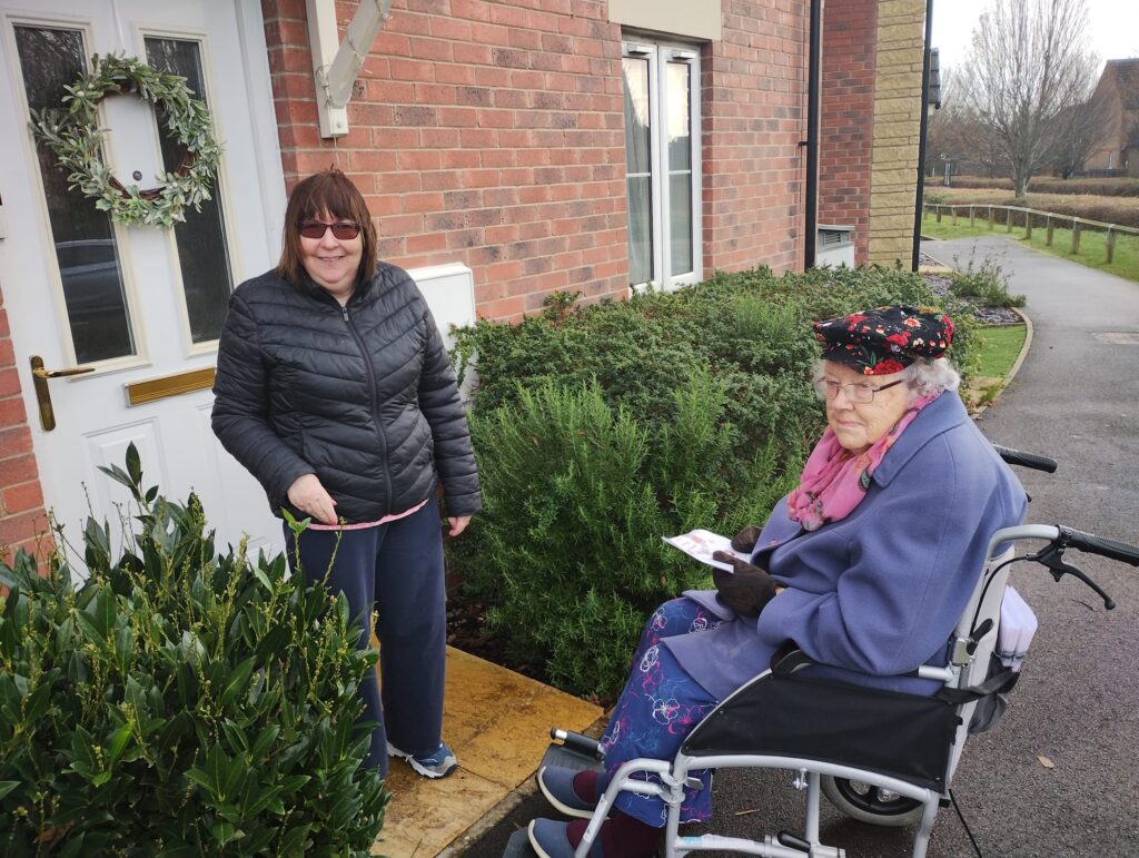residents delivering christmas cards