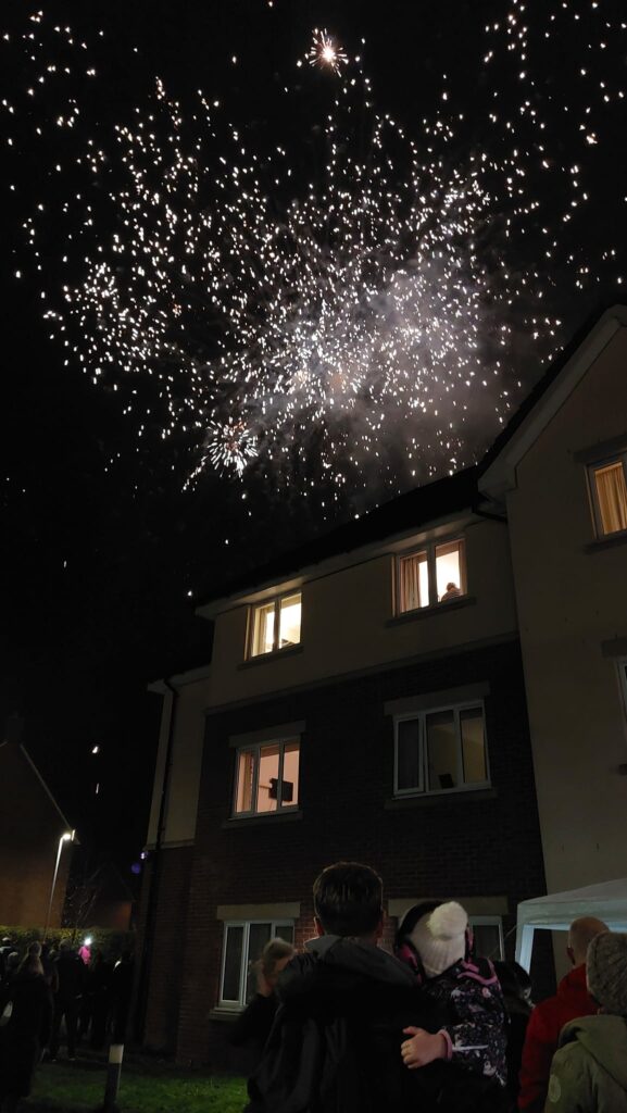 loved ones watching fireworks display