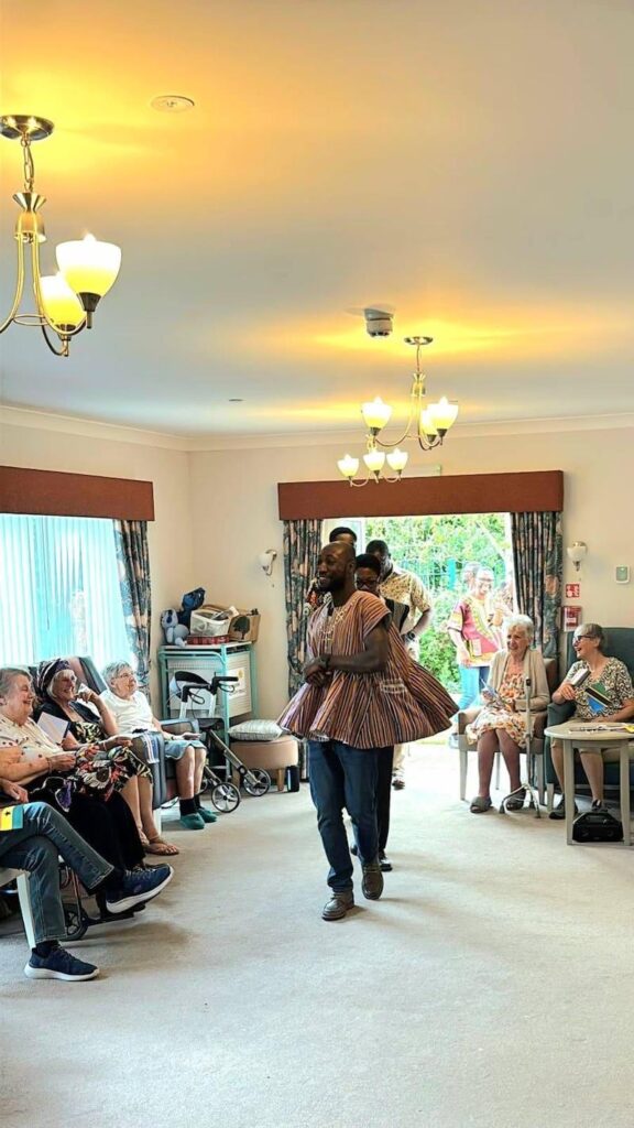 the church team performing for our residents for africa culture day