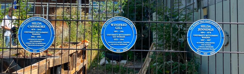three blue plaques