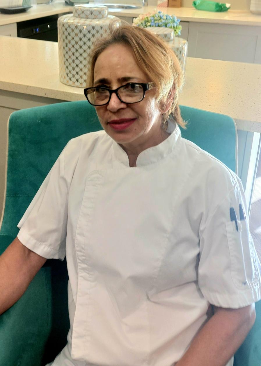 lady posing for staff photo