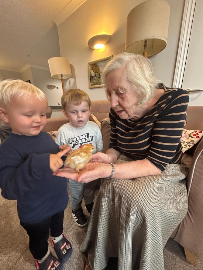 older lady and some children